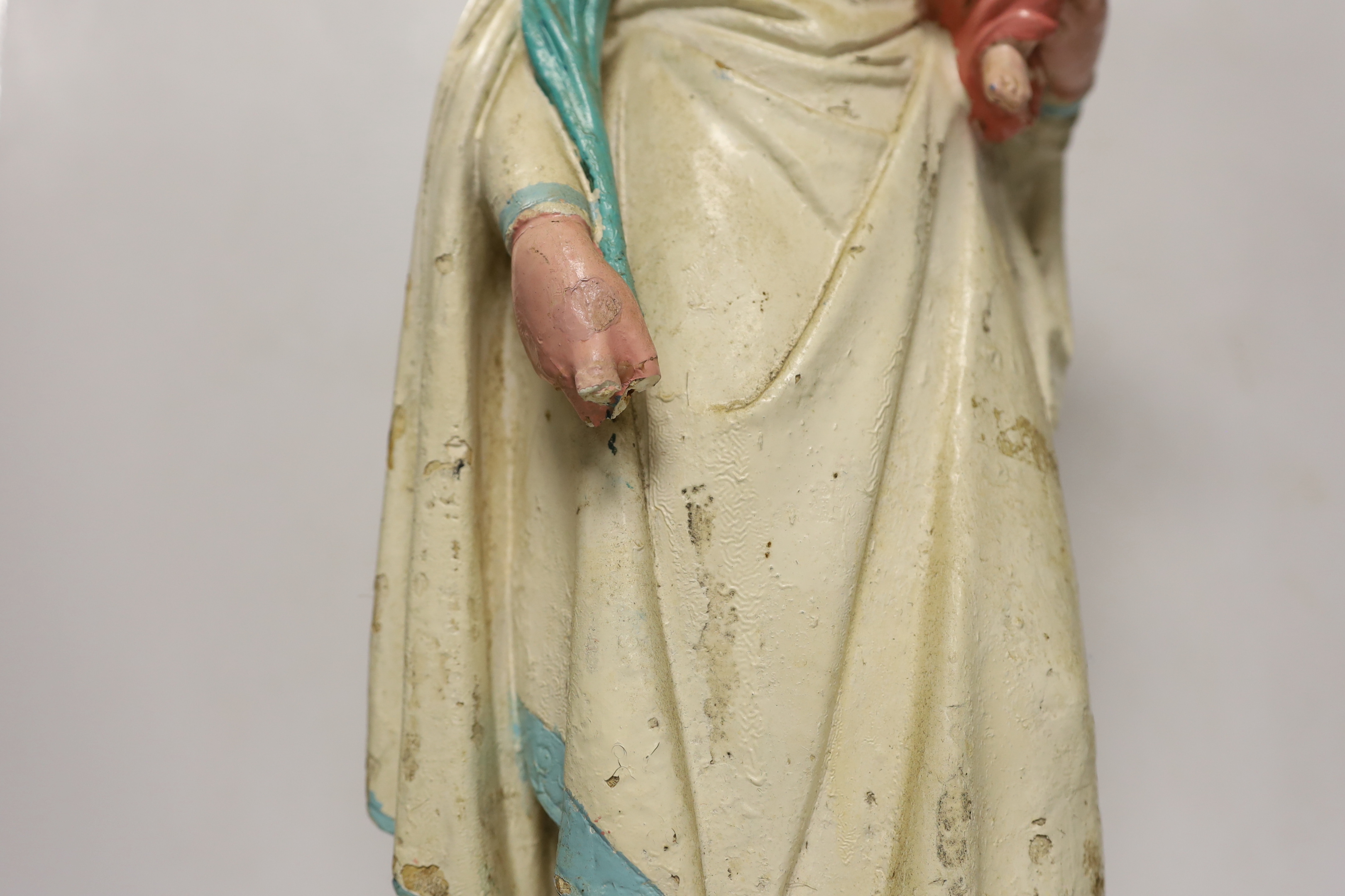 A painted plaster model of Madonna and child, 61cm high